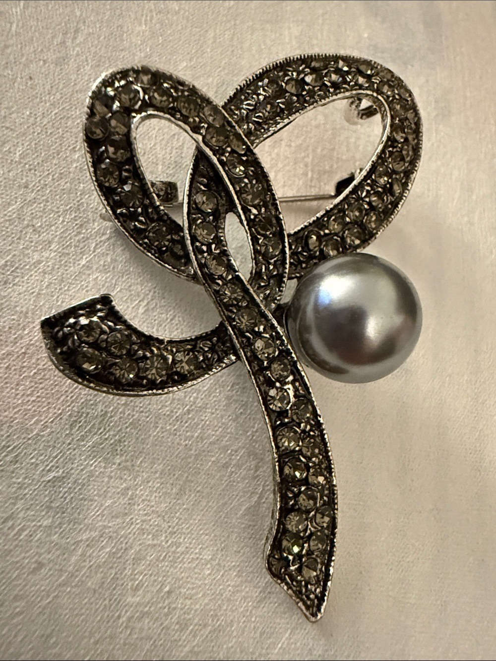 Crystal Ribbon Brooch with Silver Pearl Accent
